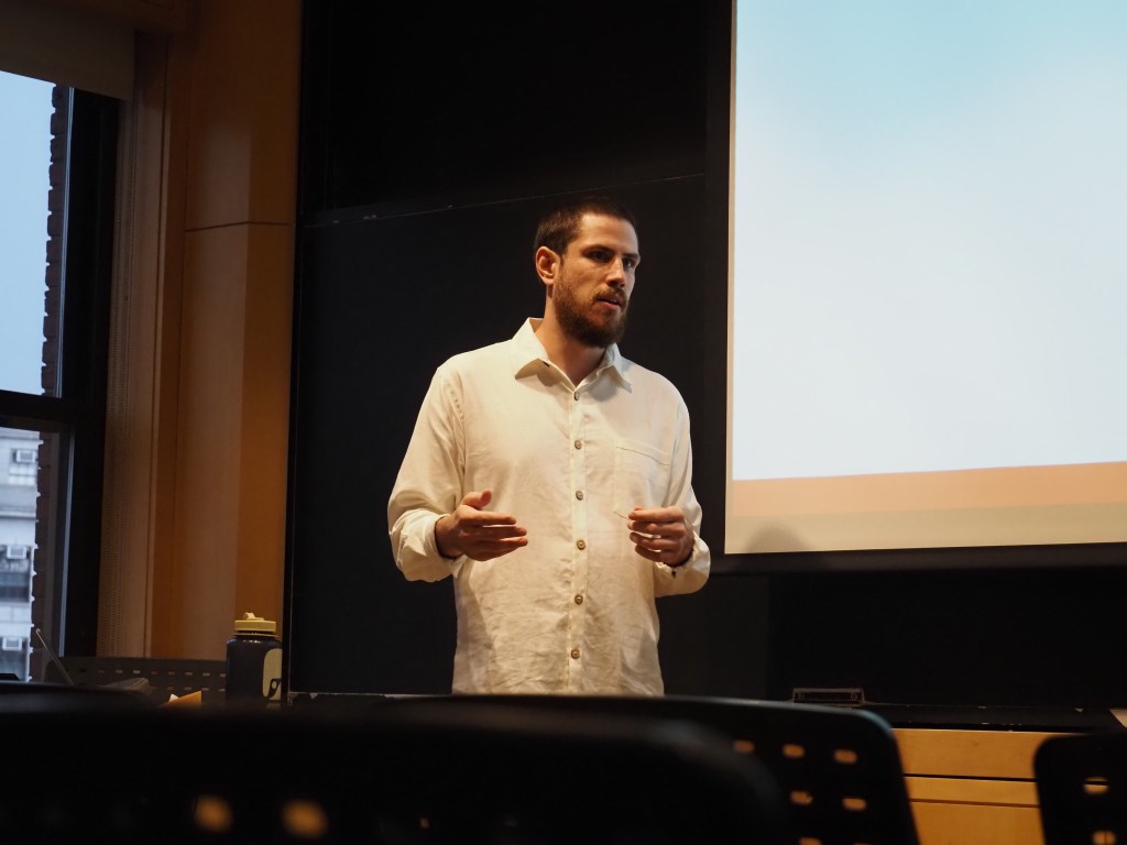 Lewis Picard delivering a talk